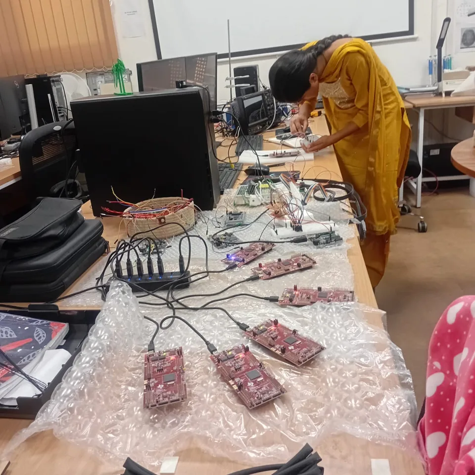 Hands-on electronics work at a laboratory bench